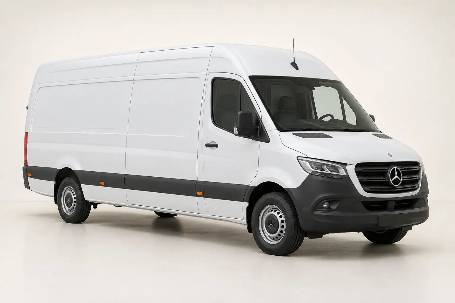 A Mercedes-Benz Sprinter courier van in a studio setting